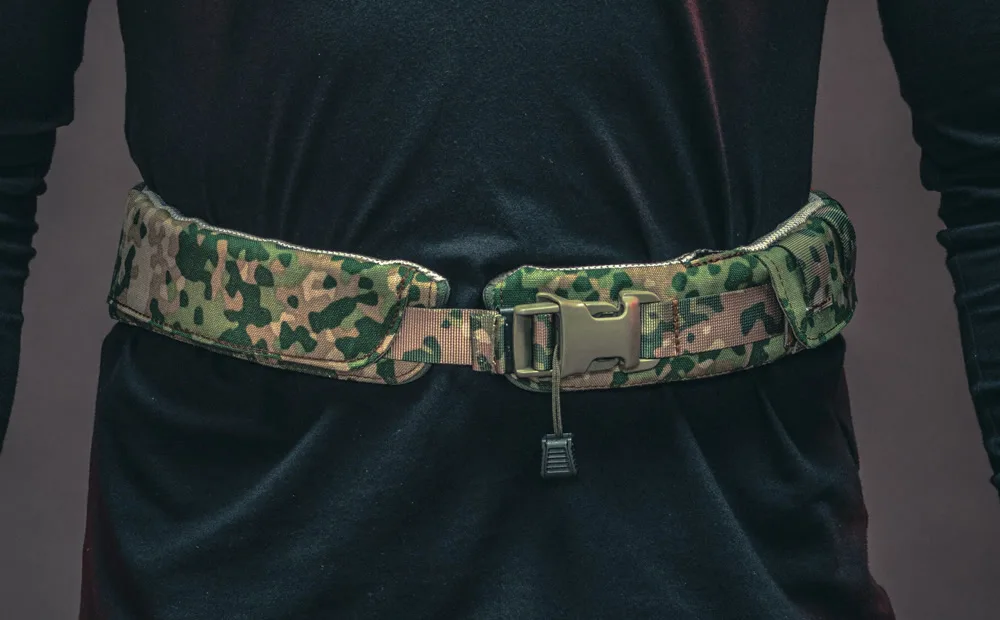 Mission Navigation Belt, a haptic navigation belt worn around the waist of a soldier